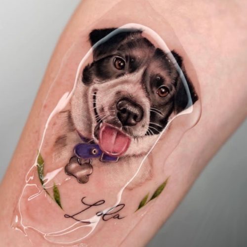 tatuaje en brazo de mascota perro