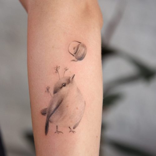 tatuaje ave realista